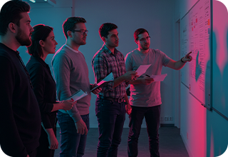 Team checking out map on screen