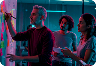 Men drawing something on map